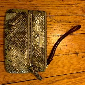 Kate Spade metallic gold wristlet zipper on top and in front